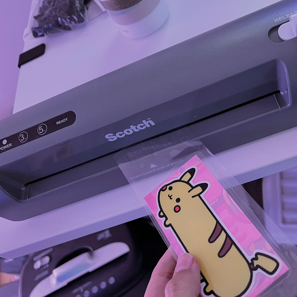 Sticker card in the laminating machine