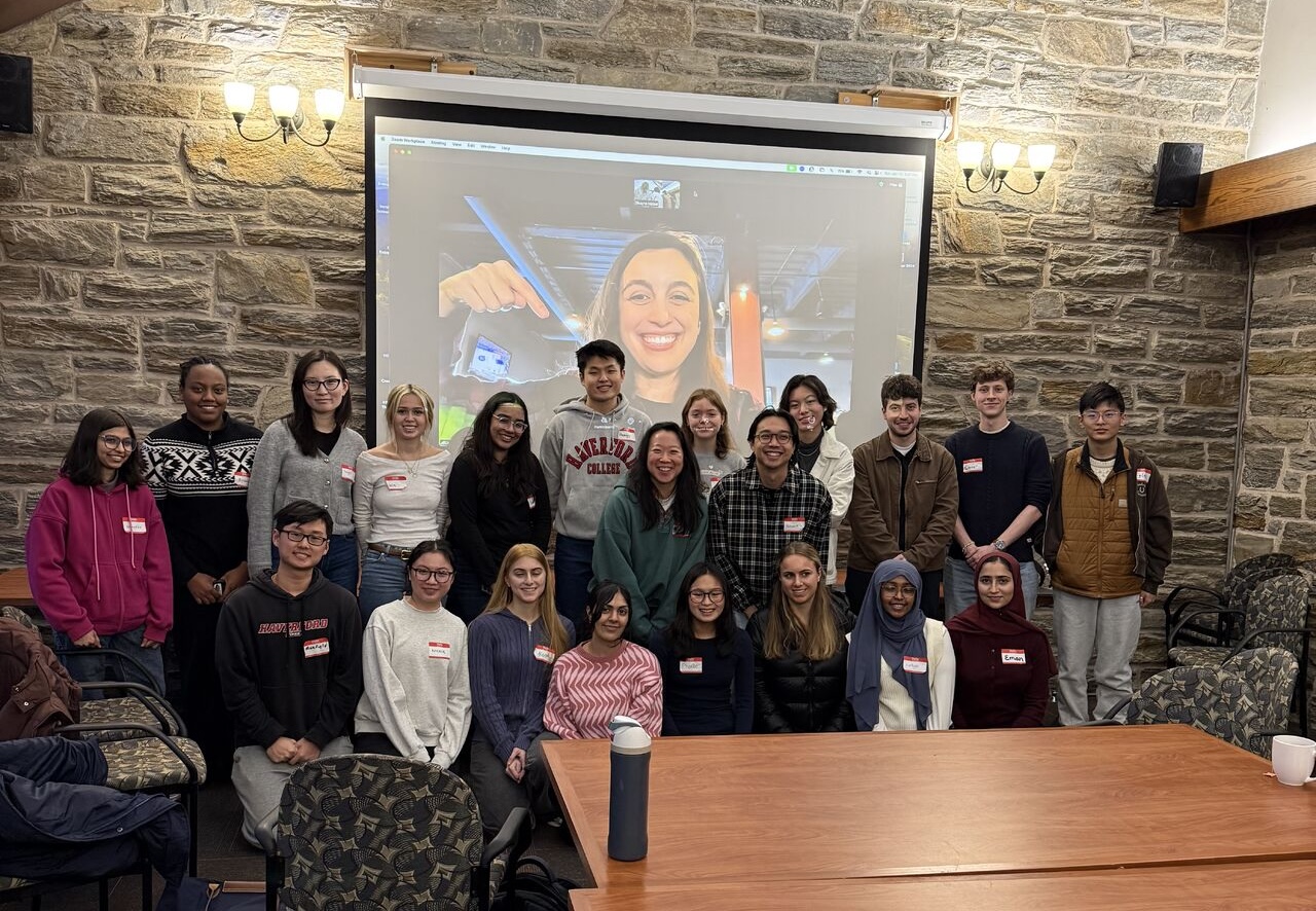 Cassidy in the group picture with the students