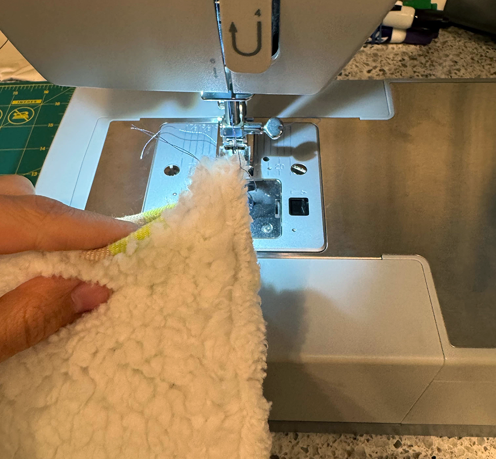 Fluffy fabric in the sewing machine